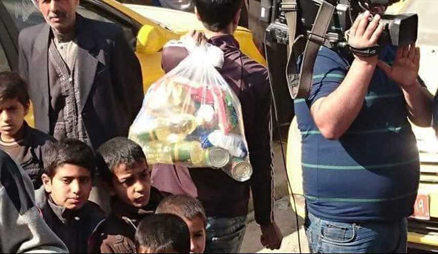 بالصور..وصول مساعدات غذائية لأهالي مدينة الموصل العراقية