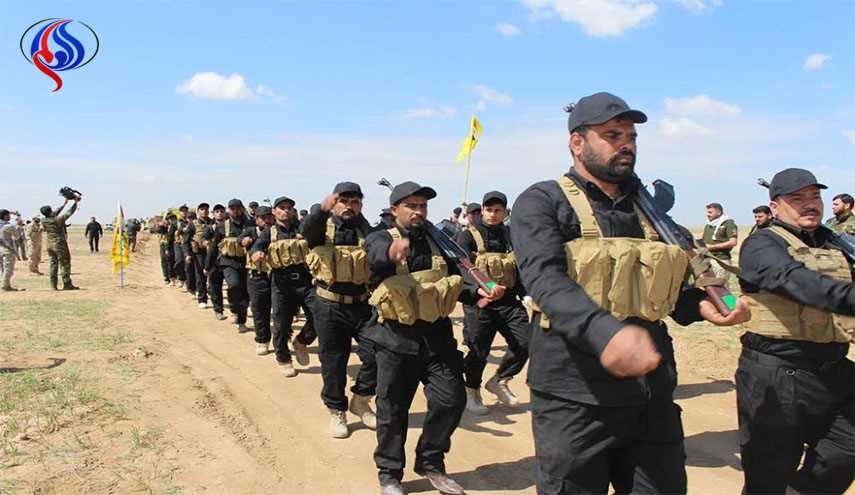 بالصور .. استعراض عسكري للحشد الشعبي غربي الموصل