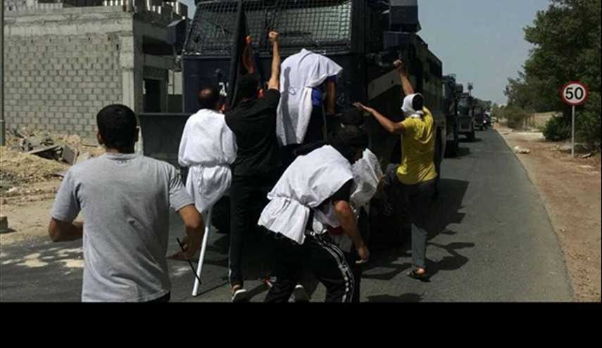 بالصور.. البحرانيون بالدراز يواجهون المركبات العسكرية والآليات المدرعة في محيط المنطقة