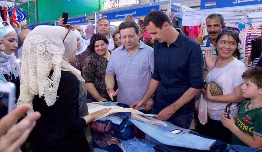 بالصور: الأسد يظهر وسط جمهوره في مهرجان للتسوّق بدمشق