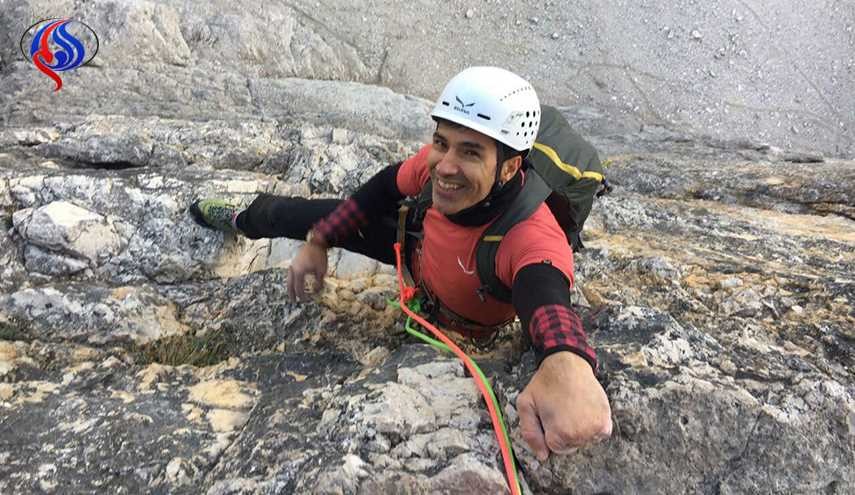 معاق إيراني يتسلق القمة الثلاثية بجبال 