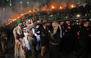 آیین مشعل گردانی در قم و تهران