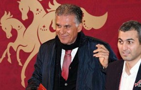 کی روش در سالن برگزاری مراسم قرعه کشی جام جهانی