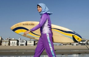 جنيف تمنع المسلمات من ارتداء ملابس السباحة 