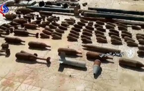 کشف و ضبط مقادیر زیادی سلاح در حومه شرقی دیرالزور + فیلم