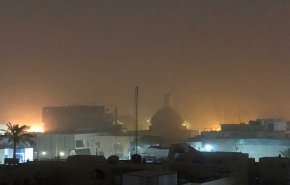 عاصفة ترابية تجتاح بغداد+صور