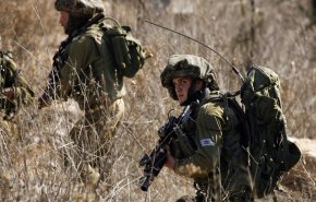 عکس | درگیری زن فلسطینی با سرباز زن اسراییلی