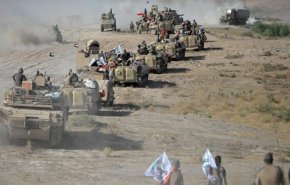 الحشد الشعبی با 50 موشک مواضع داعش را در سوریه بمباران کرد