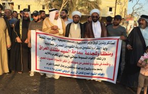 بالصور: أهالي البصرة لوزير خارجية البحرين .. 'اعتذر'

