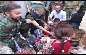 توزیع اسباب بازی در میان کودکان توسط الحشد الشعبی + عکس