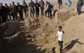 بالصور.. الكشف عن مقبرة جماعية في الفلوجة