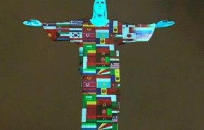 مجسمه مسیح در رنگ پرچم کشورهای درگیر کرونا