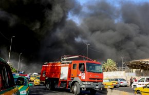 بالصورة ..حريق ضخم في الحي الصناعي وسط كربلاء يلتهم محال تجارية