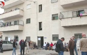 وقفة إحتجاحية مع عائلات بناية الصمود المهددة من الإحتلال بالهدم