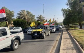 جشن و شادمانی ساکنان بغداد در سالگرد تأسیس الحشد الشعبی