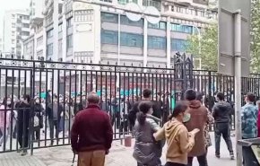 اعتراض چینی‌ها به محدودیت‌های کرونایی به شهر ووهان رسید
