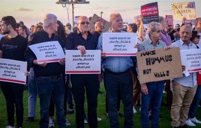 مواجهات عنيفة في 'تل أبيب' بين رافضي الحرب وداعميها! +فيديو
