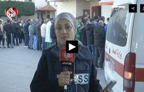 خبرنگار العالم به دنبال بستگانش در میان پیکرهای شهدا + فیلم