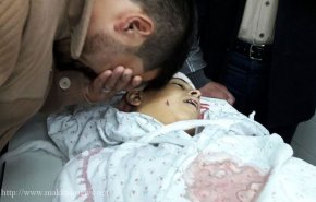 وداع سوزناک پدر فلسطینی با فرزند شهیدش + فیلم