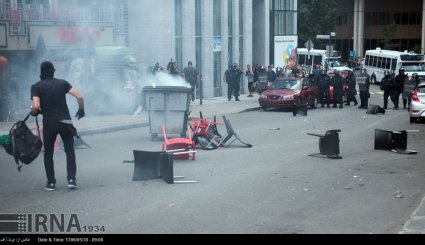 درگیری بین تظاهر کنندگان طرفدار مهاجران با پلیس کانادا - تصاویر