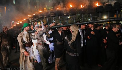 آیین مشعل گردانی در قم و تهران
