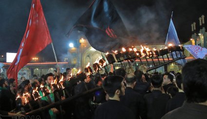 آیین مشعل گردانی در قم و تهران