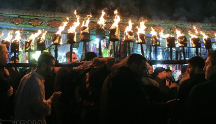 آیین مشعل گردانی در قم و تهران