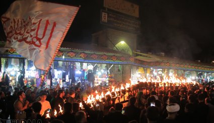 آیین مشعل گردانی در قم و تهران