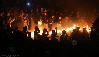 آیین مشعل گردانی در قم و تهران