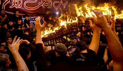 آیین مشعل گردانی در قم و تهران