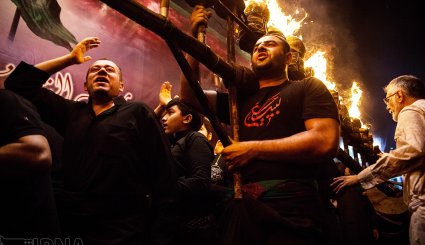 آیین مشعل گردانی در قم و تهران