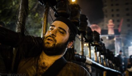 آیین مشعل گردانی در قم و تهران