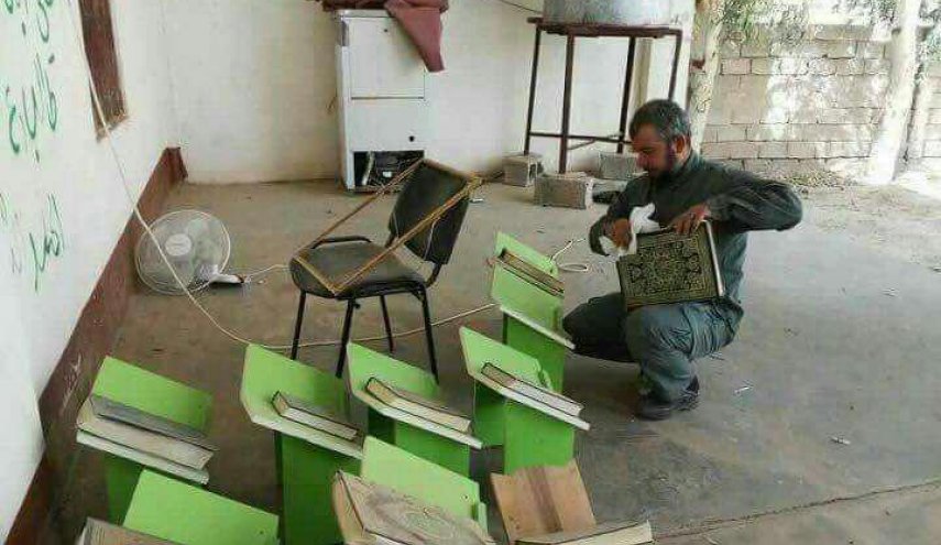 الحشدالشعبي ينظفون جامع جامع عمر بن الخطاب في ناحية الرشاد بعد تحريرها من داعش