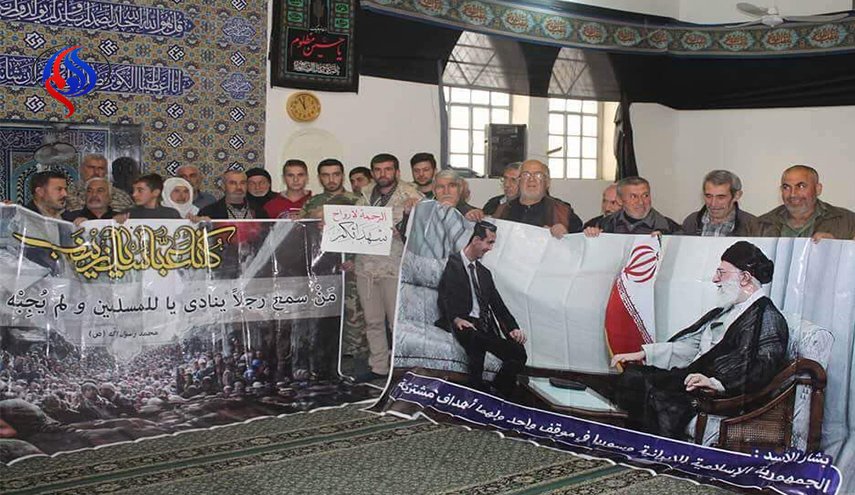 بالصور؛ اهالي نبل والزهراء يواسون ايران بضحايا الزلزال