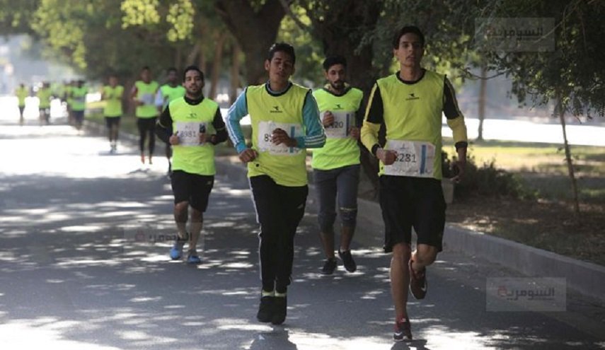 بالصور: 1400 متسابق في ماراثون 