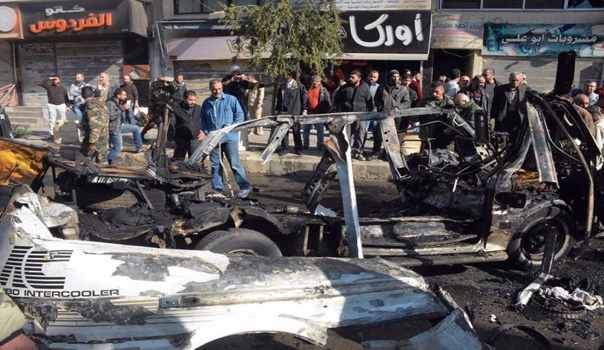 الصور الاولى لتفجير حافلة الركاب في حي عكرمة بحمص