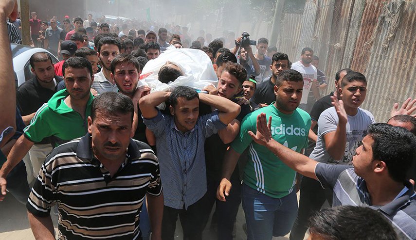 بالصور... جماهير غزة تشيّع الشهيد محمد أبو حليمة