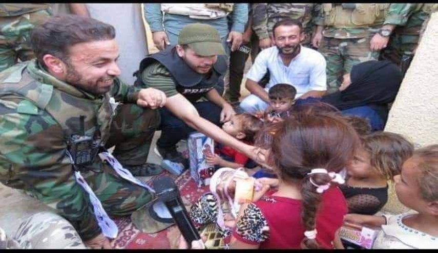 توزیع اسباب بازی در میان کودکان توسط الحشد الشعبی + عکس
