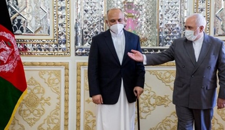 گفتگوی تلفنی ظریف و اتمر/ آمادگی ایران برای کمک به روند صلح در افغانستان
