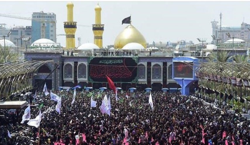 ورود موکب عزاداران کفن پوش به حرم سید الشهدا در ظهر عاشورا
